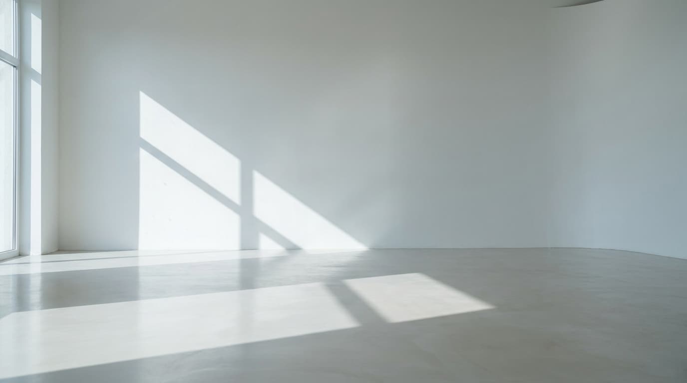 Empty white studio with window light across the wall and floor, made with Nano Banana Pro