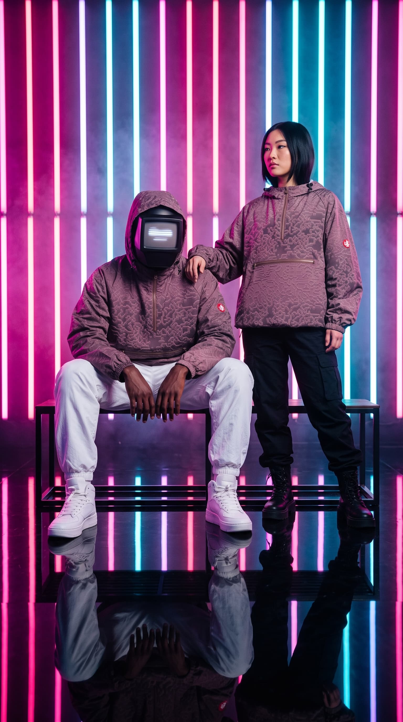 Two people in matching circuit-pattern anoraks on a mirror floor before neon bars, made with gemini