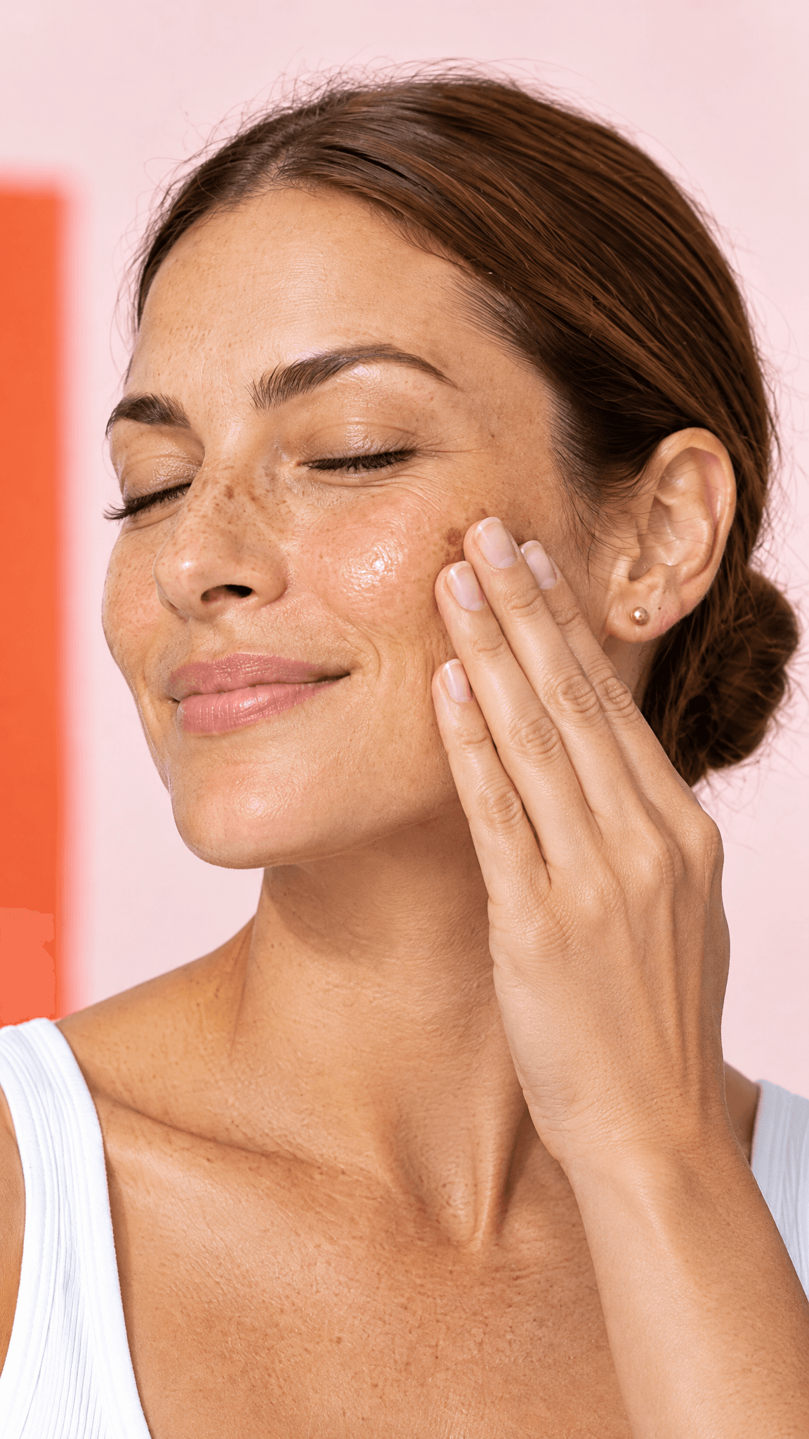 Freckled woman pressing serum into her cheekbone with her fingertips, eyes closed, made with GPT Image 2.5 Flare