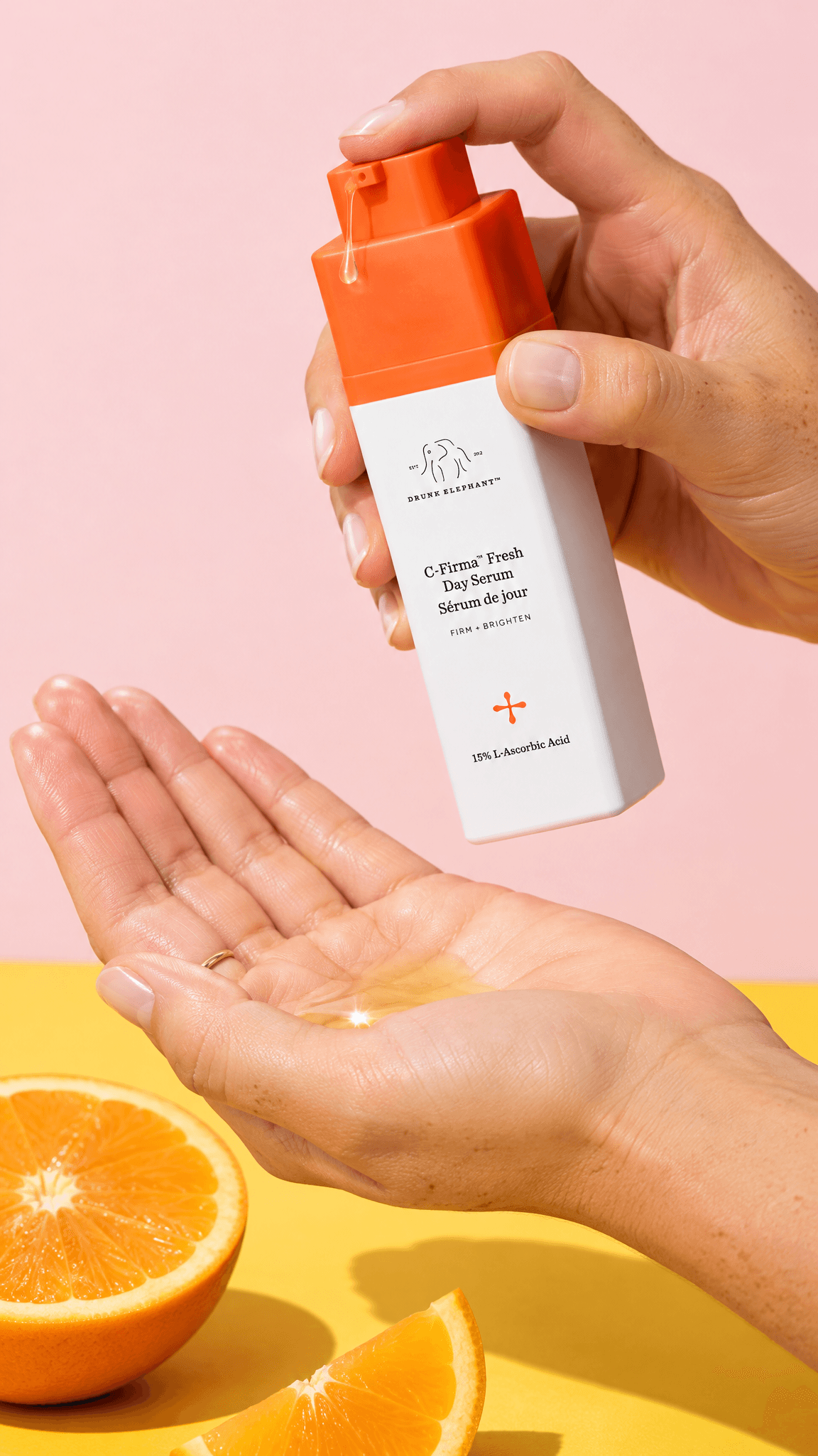 Hands pumping Drunk Elephant serum into a cupped palm with orange halves below, made with GPT Image 2.5 Flare