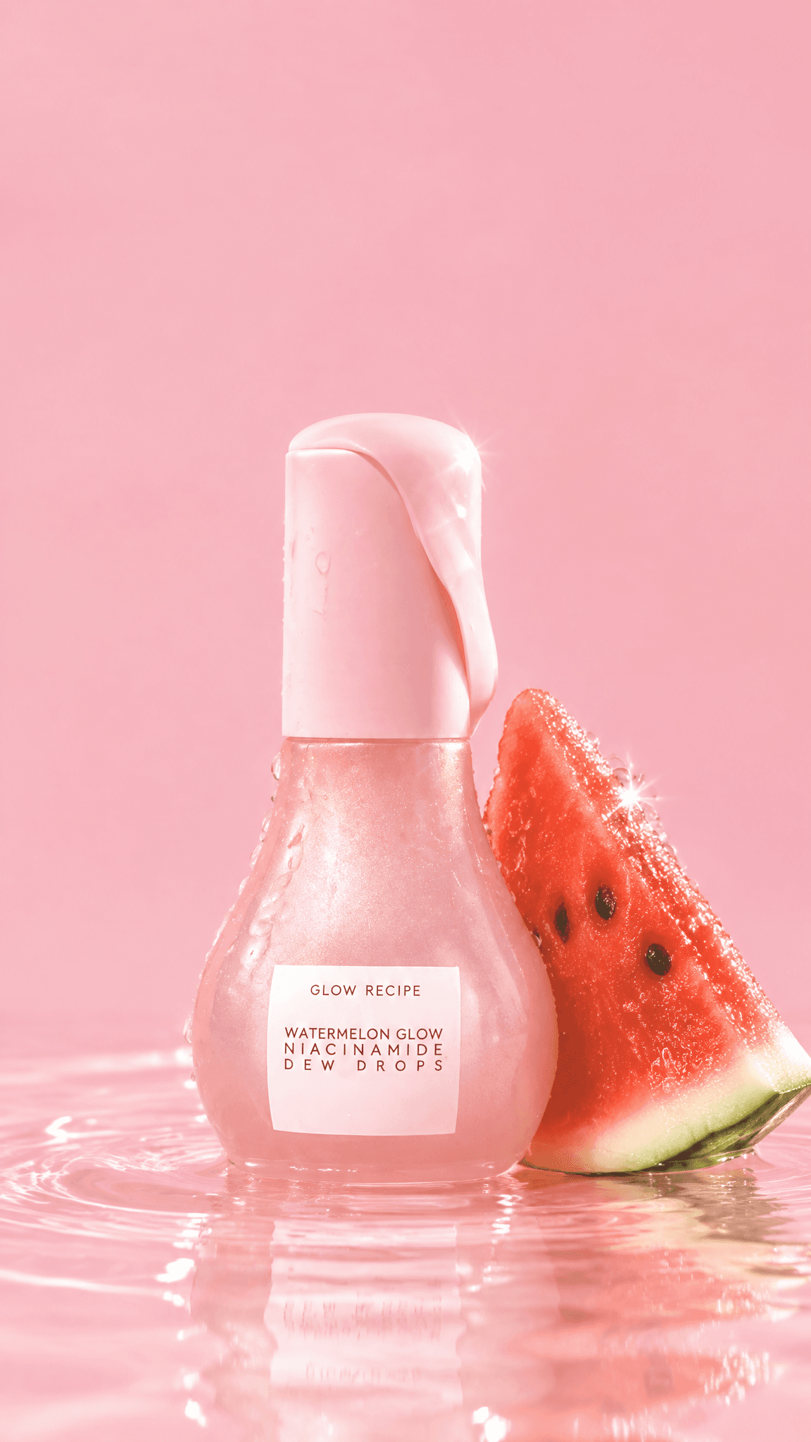 Glow Recipe Watermelon Dew Drops bottle in rippling pink water with a watermelon wedge, made with GPT Image 2.5 Flare