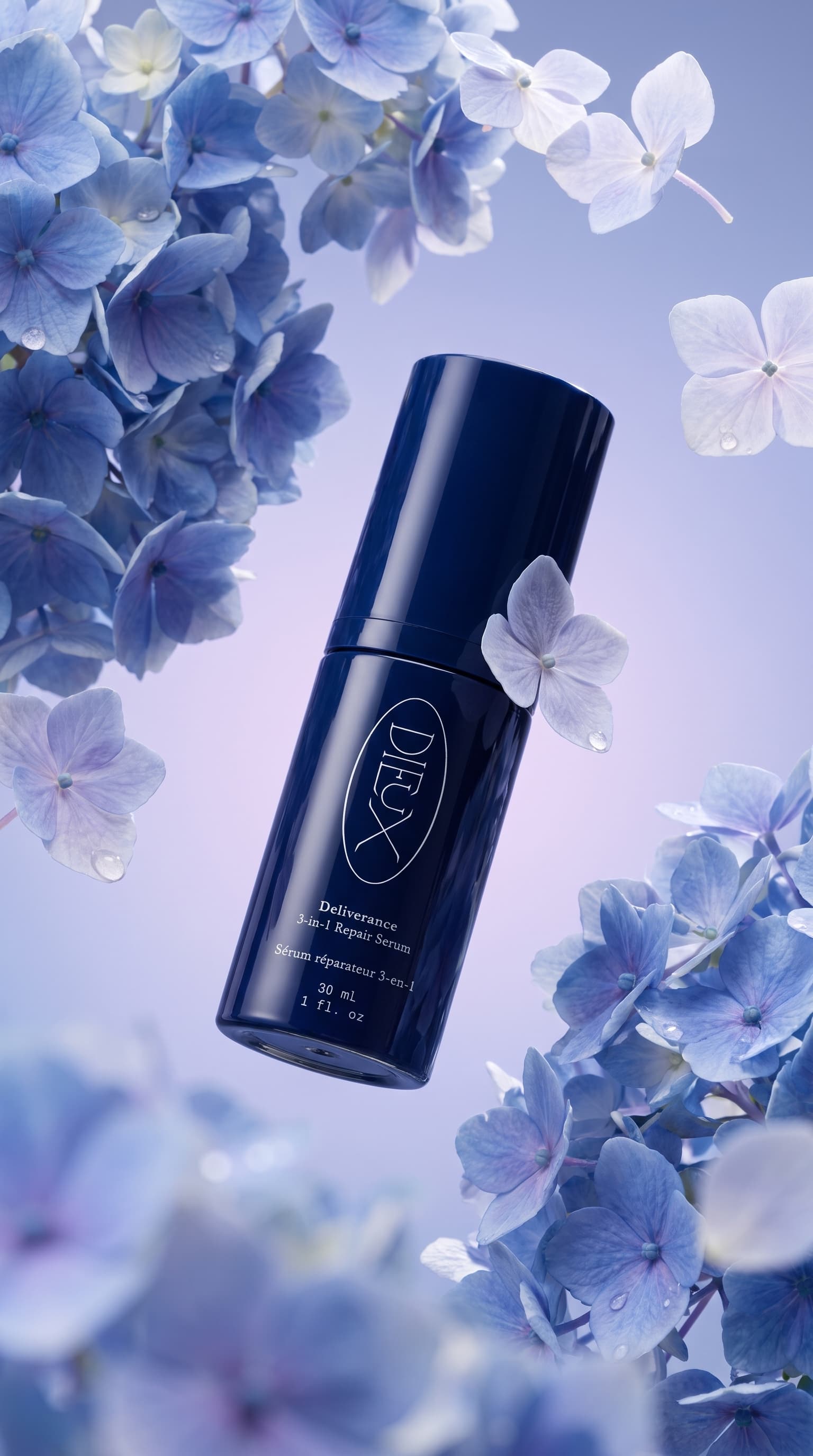 Navy serum bottle floating among blue hydrangea petals on a lilac to blue backdrop, made with Nano Banana Pro