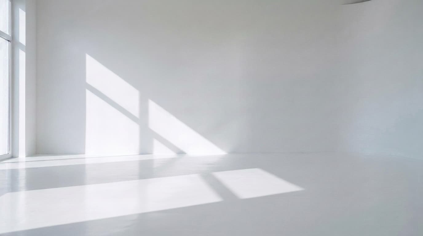 Empty white studio with window light across the wall and floor, made with Nano Banana Pro