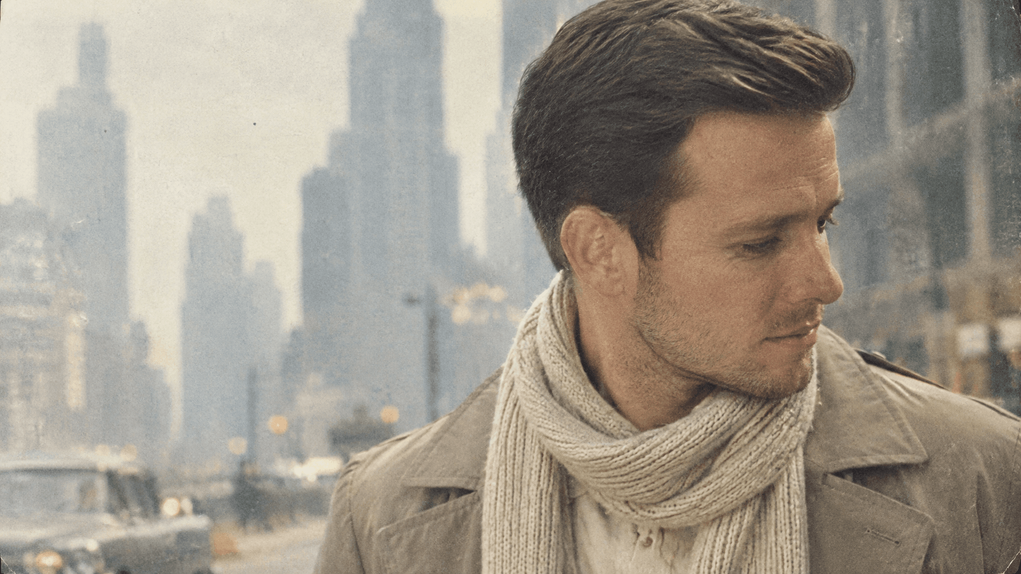 A 1960s-style editorial photo of a man in a beige trench coat and cream scarf, tight crop, faded warm grain, made with GPT Image 2.5 Flare