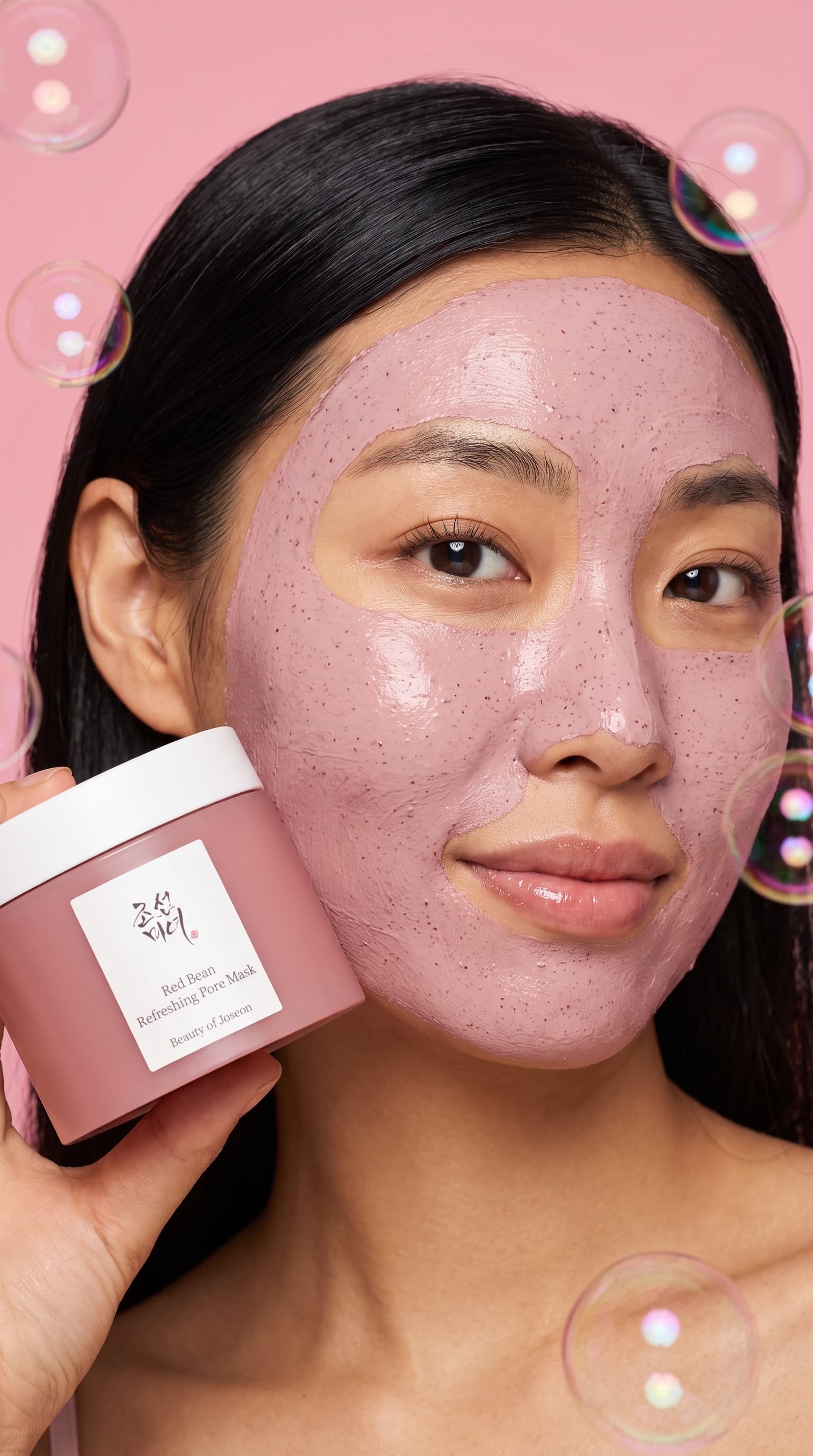 Woman wearing a pink clay mask holding the jar by her cheek with bubbles around her, made with Nano Banana Pro